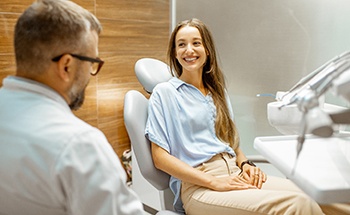 Lady consults with dentist