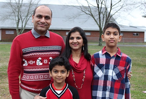 Doctor Patel and his family outdoors